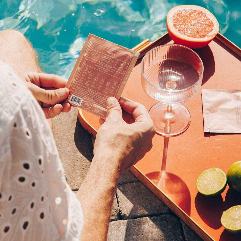 
                  
                    Person by a pool with a Paloma Mixxer
                  
                