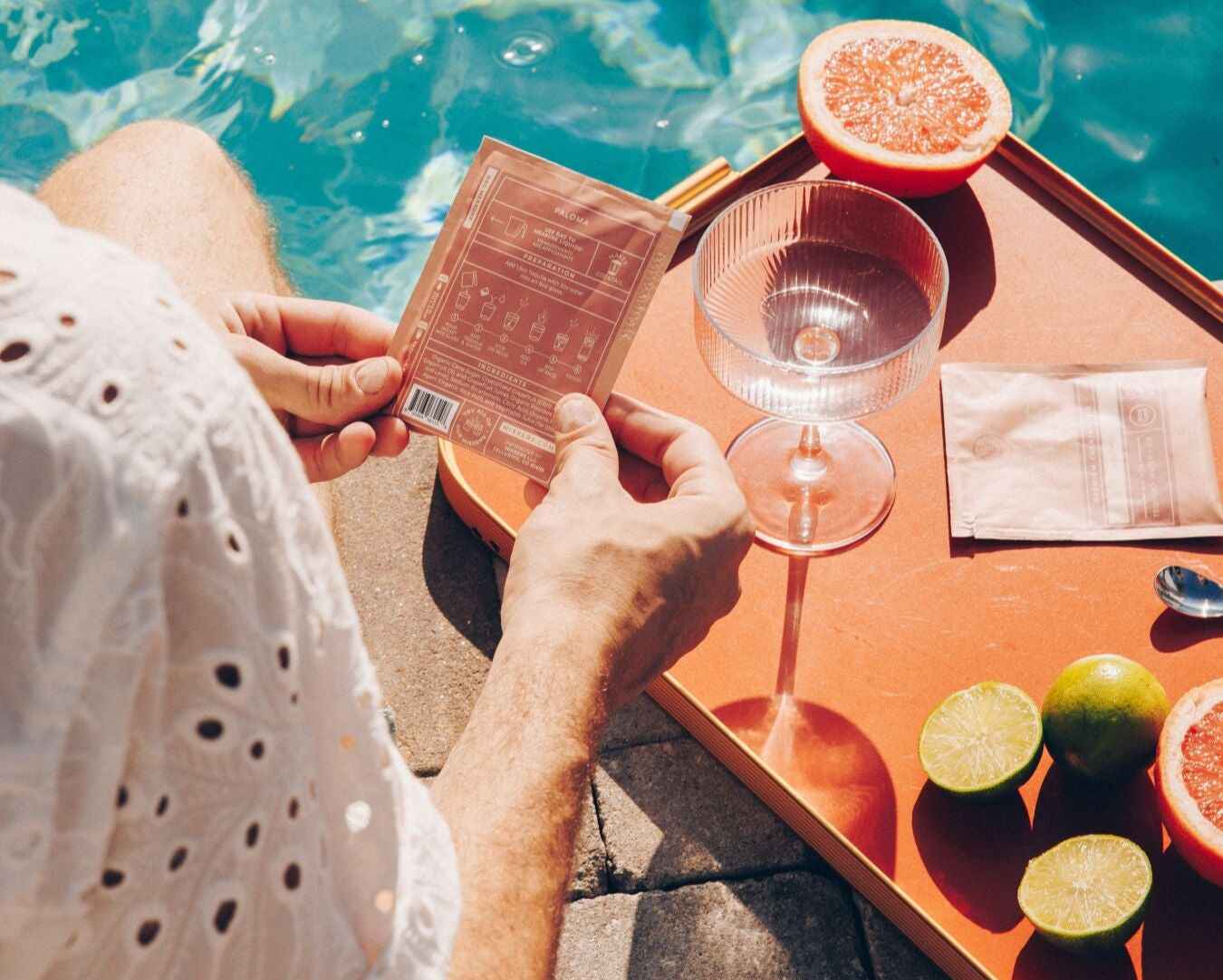 
                  
                    Person by a pool with a Paloma Mixxer
                  
                